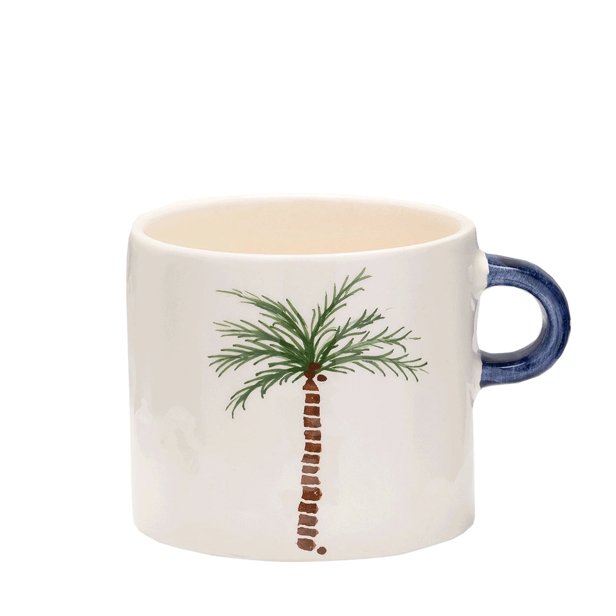 كوب مزين بشجرة النخيل