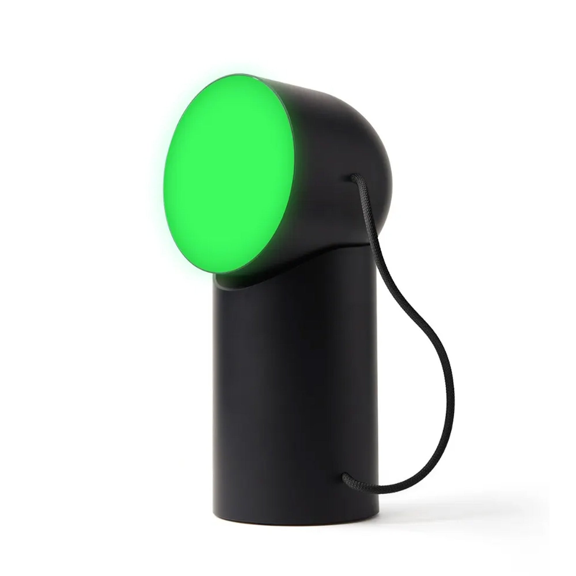 Black handheld device with a green light