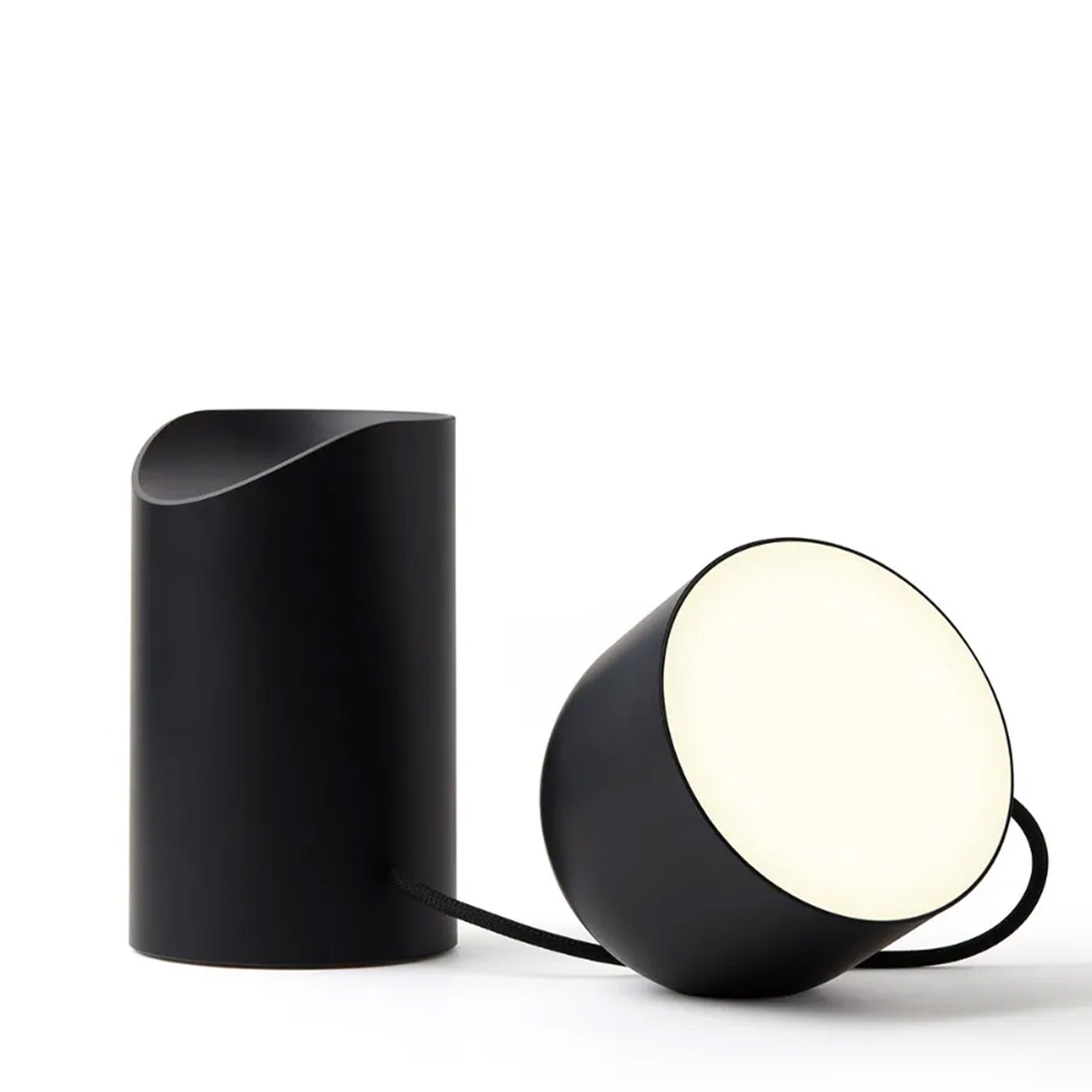 Modern black table lamp with a white shade